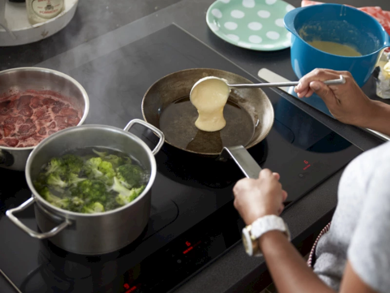 Schoonmaken van de kookplaat